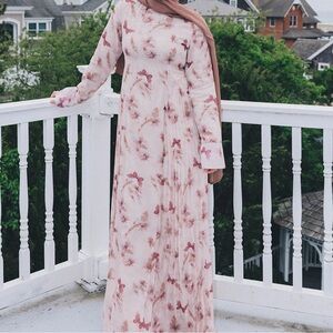 Organza floral dress with butterfly design.